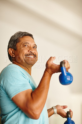 Buy stock photo Cropped shot of a mature man working out