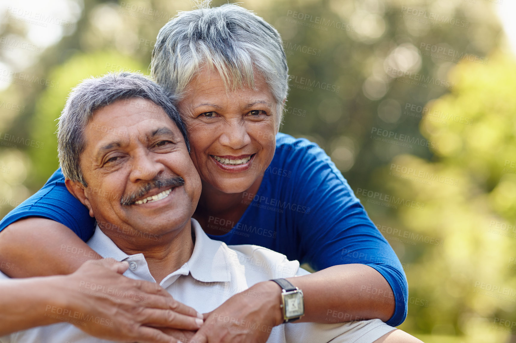 Buy stock photo Shot of a loving senior couple enjoying quality time together outdoors