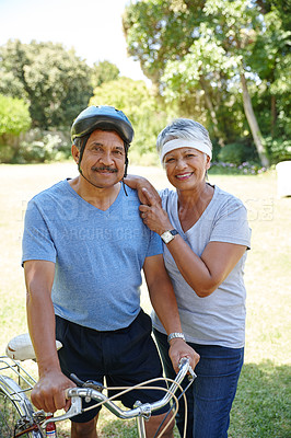 Buy stock photo Shot of a happy senior couple enjoying their exercise together outdoors