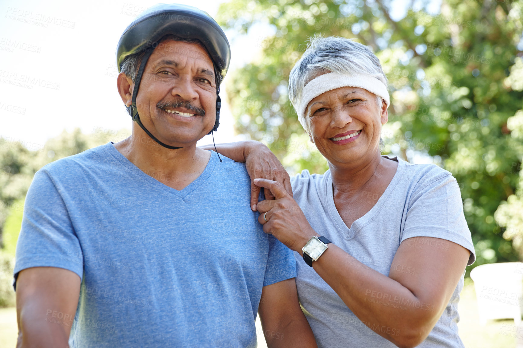 Buy stock photo Shot of a happy senior couple enjoying their exercise together outdoors
