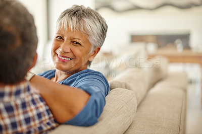 Buy stock photo Shot of a happy senior couple enjoying quality time together at home