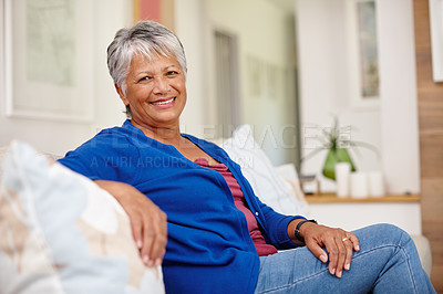 Buy stock photo Portrait of an attractive senior woman enjoying a relaxing day at home