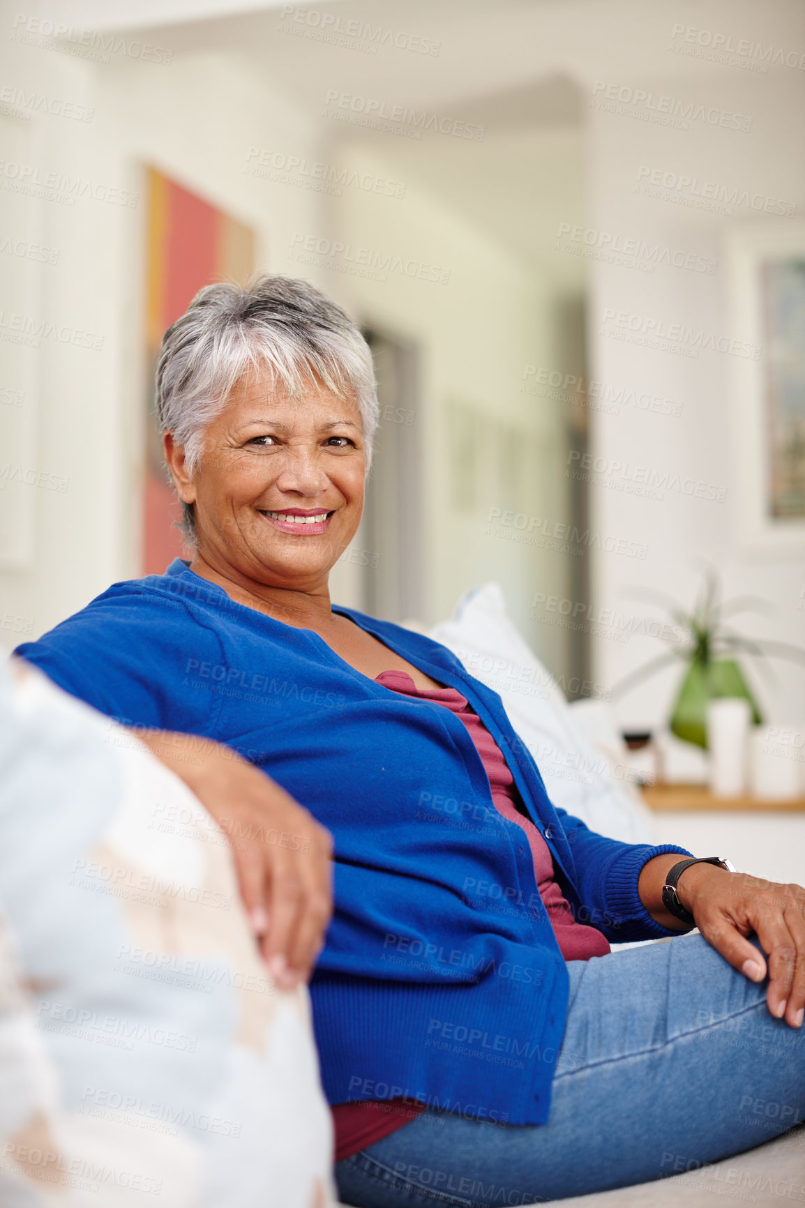 Buy stock photo Portrait of an attractive senior woman enjoying a relaxing day at home