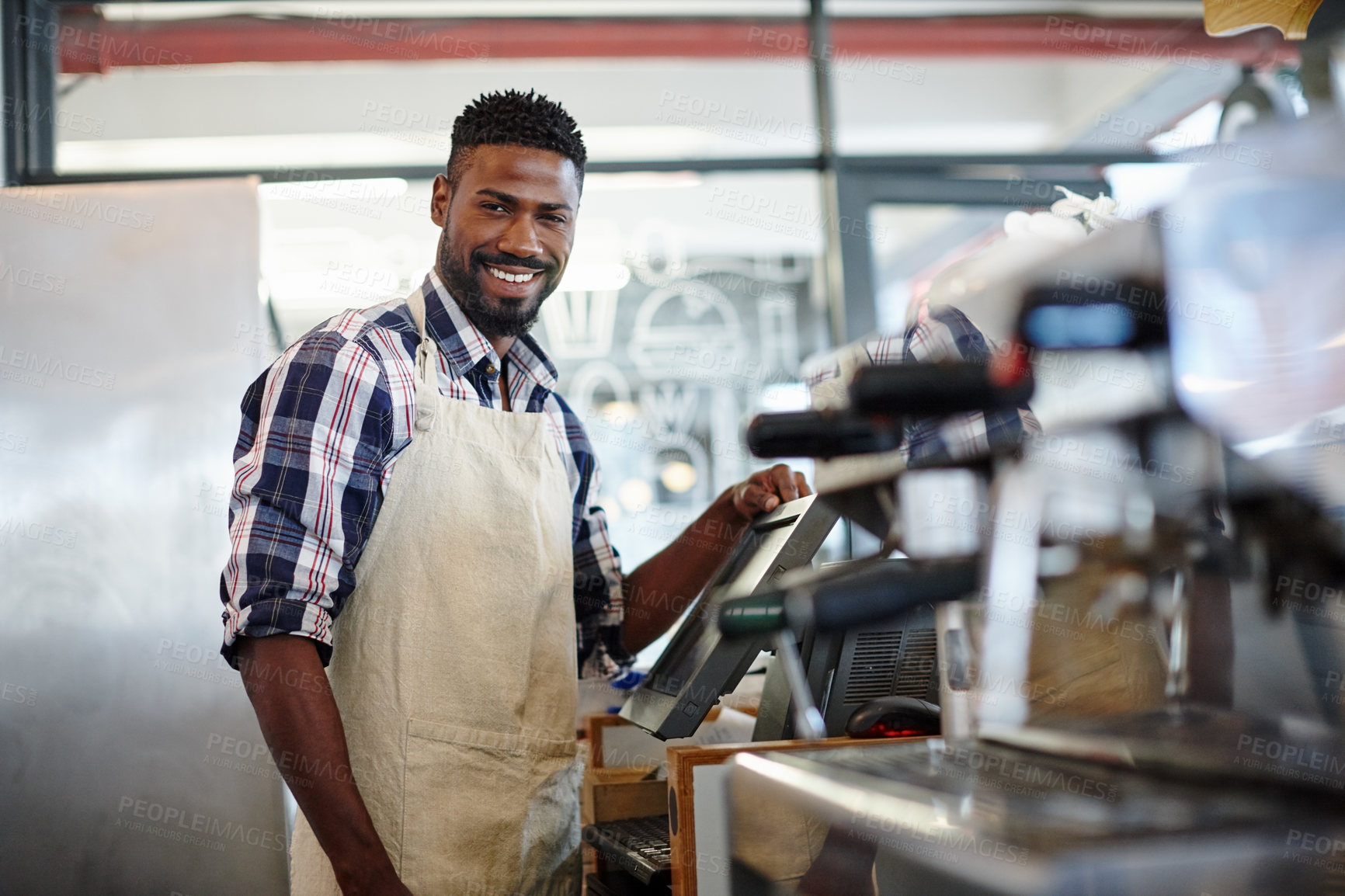 Buy stock photo Cropped portrait of a handsome male barista working in a coffee shop