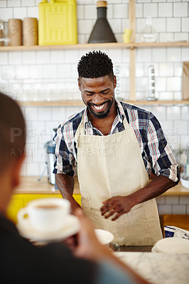 Buy stock photo Cropped shot of a handsome young man serving a customer in his coffee shop