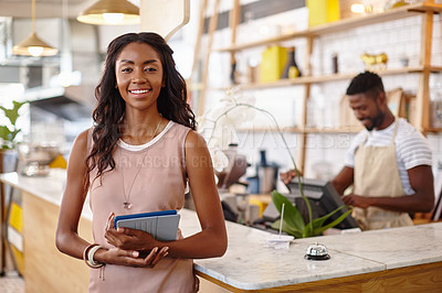 Buy stock photo Portrait of a bistro owner using a digital tablet