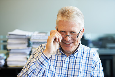 Buy stock photo Smile, glasses and senior man in the office with positive, good and confident attitude. Professional, happy and portrait of elderly male financial consultant with spectacles in modern workplace.