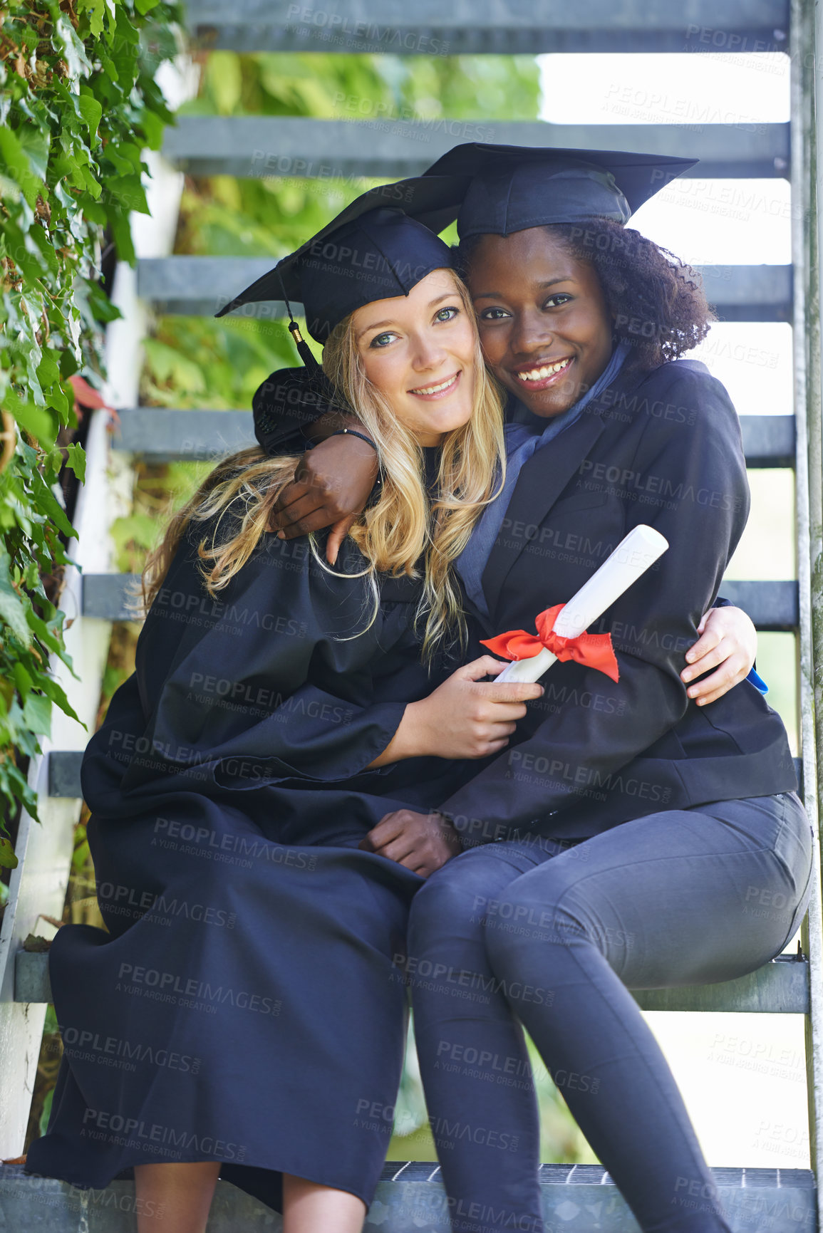 Buy stock photo Graduation, college and women or friends hug for education achievement, success and celebration of diploma. Portrait of students in diversity with law certificate, university campus by stairs