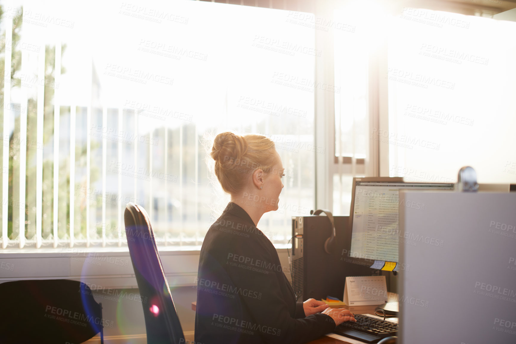 Buy stock photo Business woman, computer and working at office desk with email, planning and software for human resources. Worker, employee or person typing on desktop PC for information and organizing in lens flare