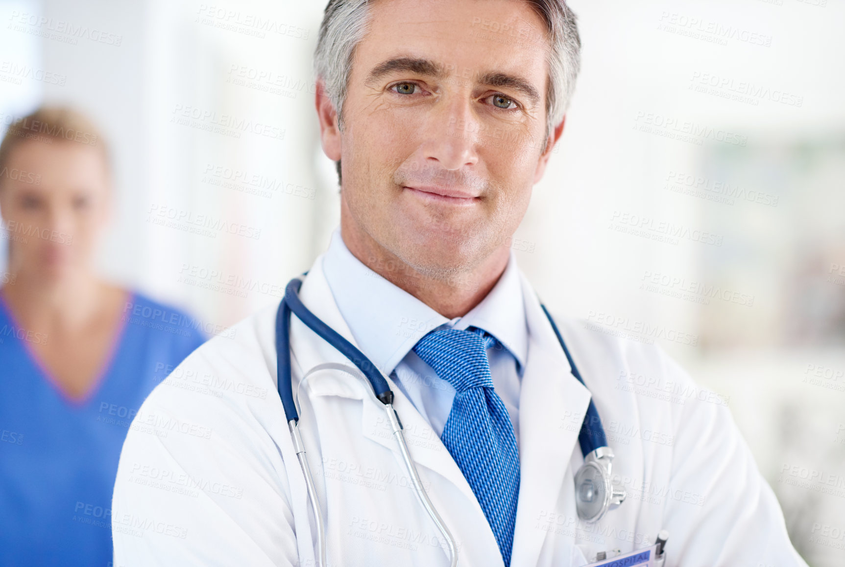 Buy stock photo Hospital, medical and portrait of man doctor with positive, confident and pride for career. Smile, healthcare and professional mature male cardiology surgeon from Australia working in clinic.