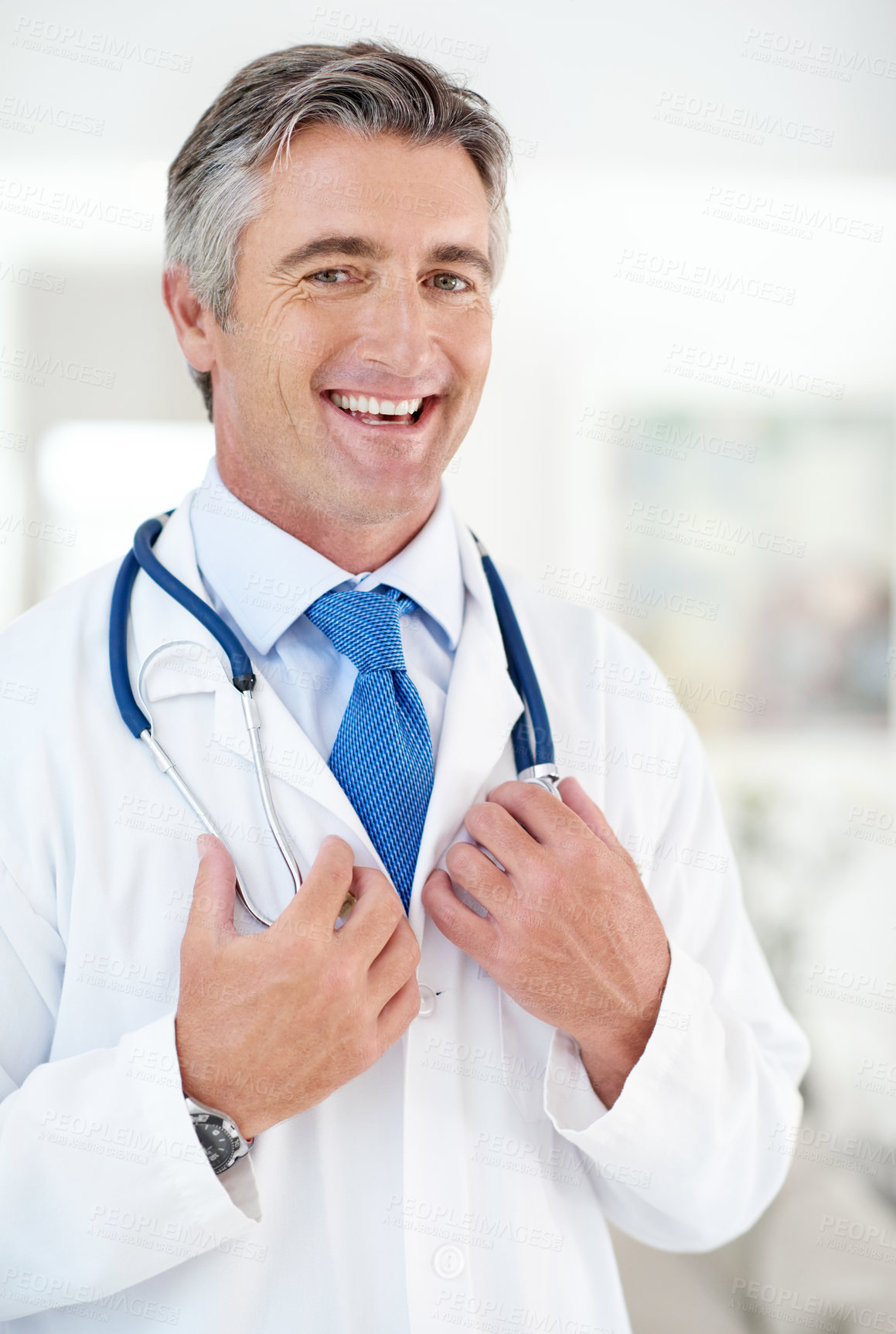 Buy stock photo Hospital, doctor and portrait of man with stethoscope for medical service, career and consulting. Professional, healthcare and happy person with equipment for cardiology, medicine and wellness