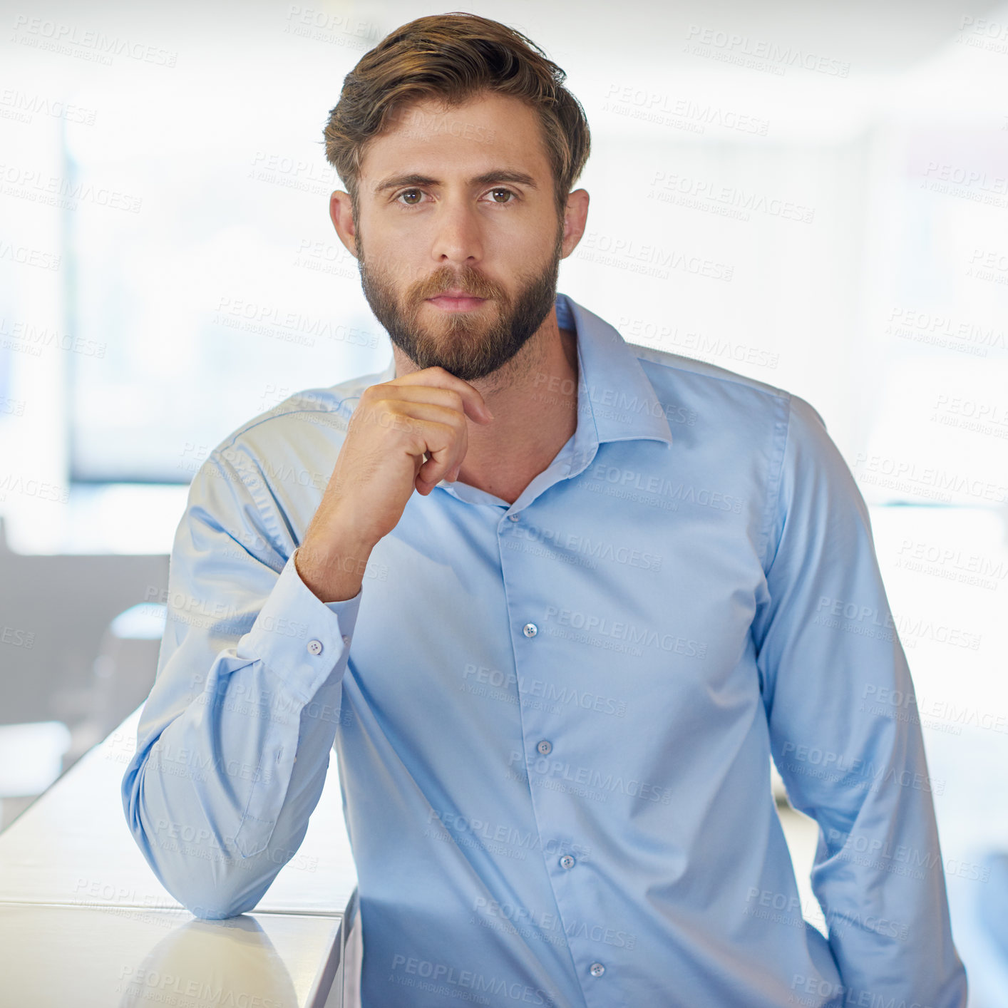 Buy stock photo Cropped portrait of a handsome young businessman in the office