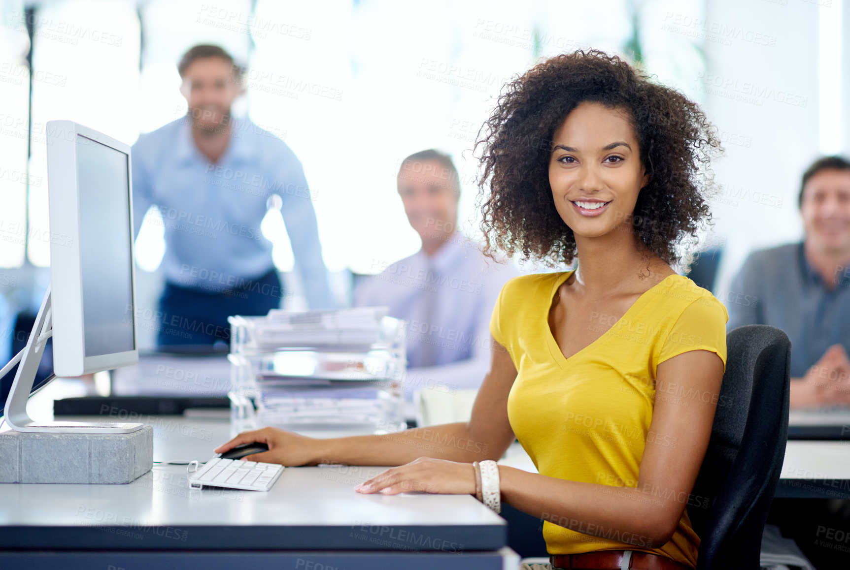 Buy stock photo Portrait of an attractive young businesswoman with her colleagues in the background