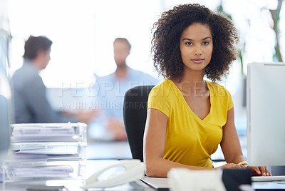 Buy stock photo Cropped portrait of an attractive young businesswoman sitting at her desk at the office