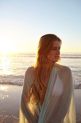 Buy stock photo Cropped shot of an attractive young woman in a bikini on the beach