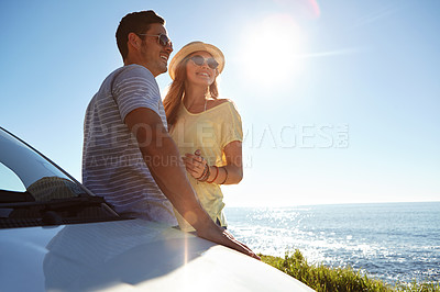 Buy stock photo Cropped shot of an affectionate young couple on a roadtrip