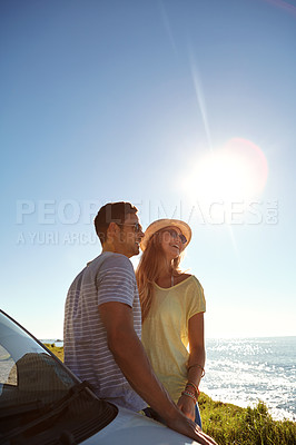 Buy stock photo Cropped shot of an affectionate young couple on a roadtrip