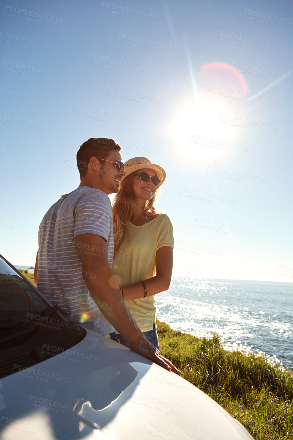 Buy stock photo Cropped shot of an affectionate young couple on a roadtrip