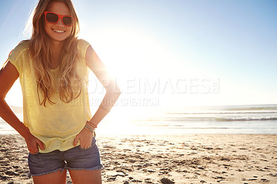 Buy stock photo Cropped shot of an attractive young woman on the beach