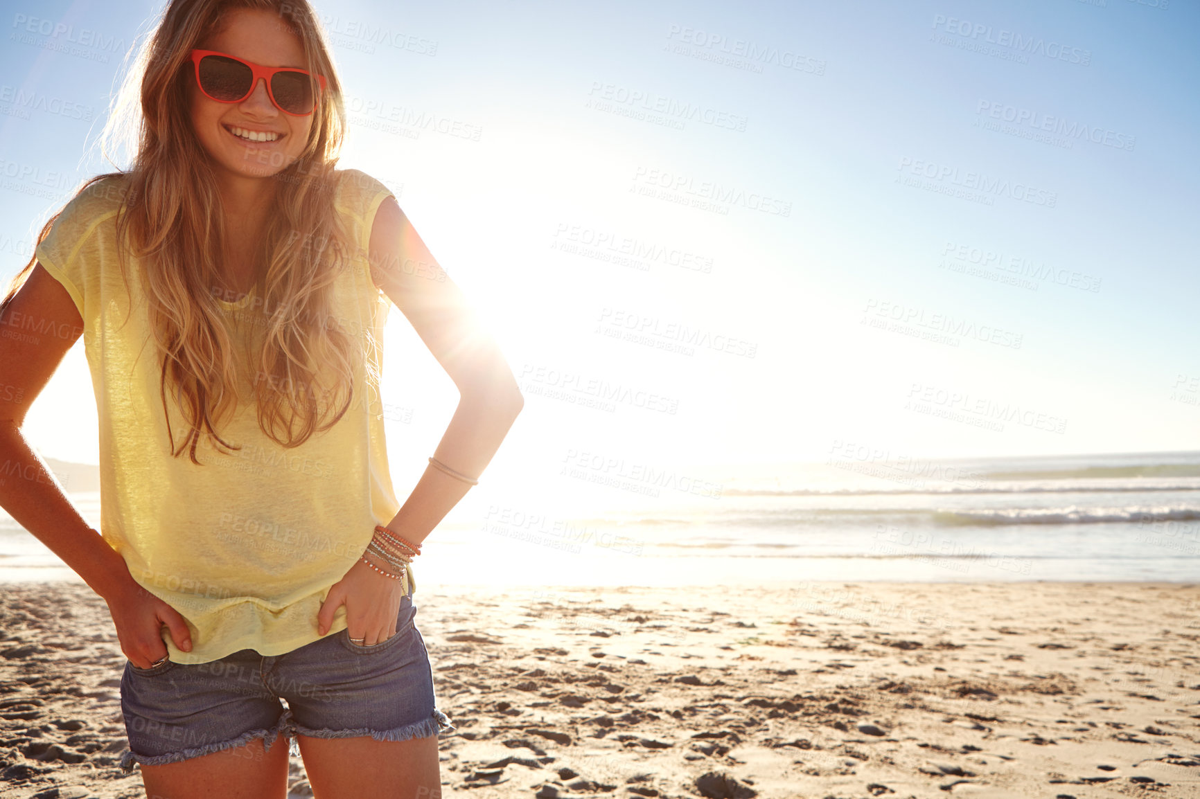 Buy stock photo Cropped shot of an attractive young woman on the beach