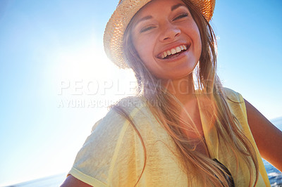 Buy stock photo Cropped shot of an attractive young woman on the beach