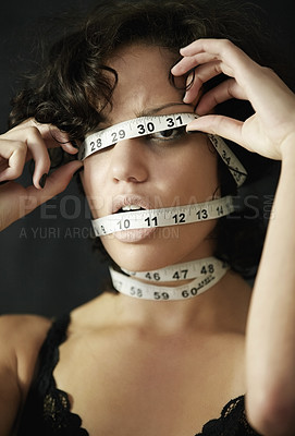 Buy stock photo Anorexia, measuring tape and cover with face of woman for eating disorder, weight loss and fear. Diet, frustrated and mental health with female for anxiety, stress and bulimia problem or issue