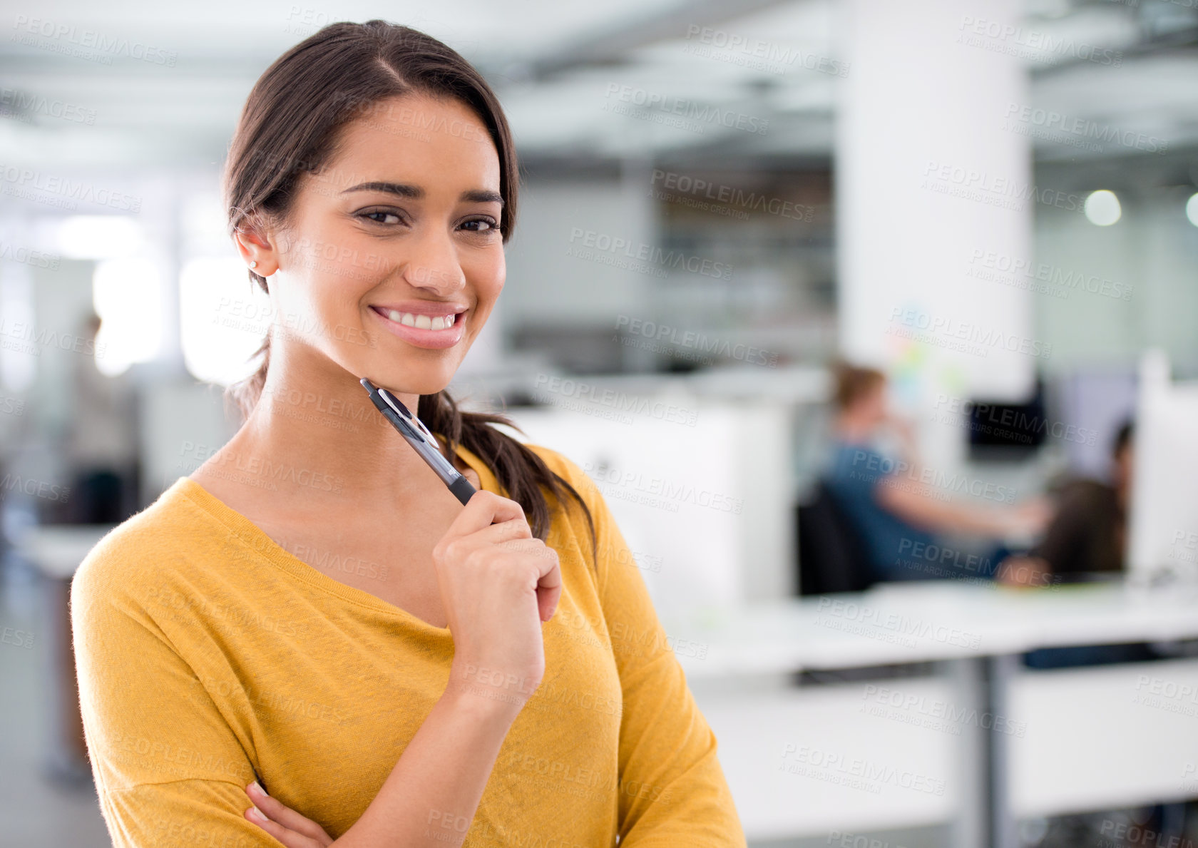 Buy stock photo Cropped shot of an attractive young businesswoman in the office