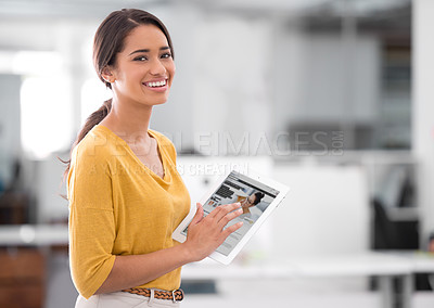 Buy stock photo Cropped shot of a businesswoman holding a digital tablet