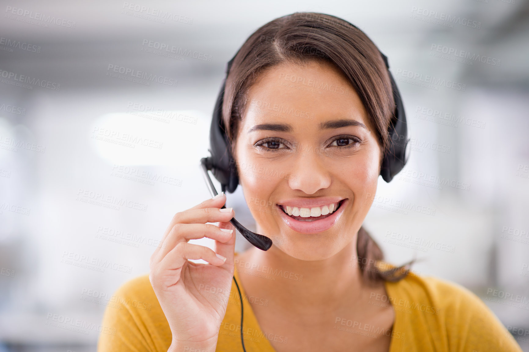 Buy stock photo Portrait of an attractive young customer service representative wearing a headset