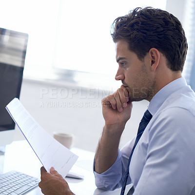 Buy stock photo Businessman, paperwork and reading at desk or report review as consultant for finances, investment or budget. Male person, thoughts and legal document in New York or office, brainstorming or project