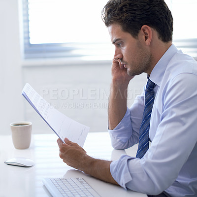 Buy stock photo Businessman, paper and thinking in office for report, analysis and brainstorming with strategy at desk. Professional man, documents and reading with planning for budget, schedule or agenda at work