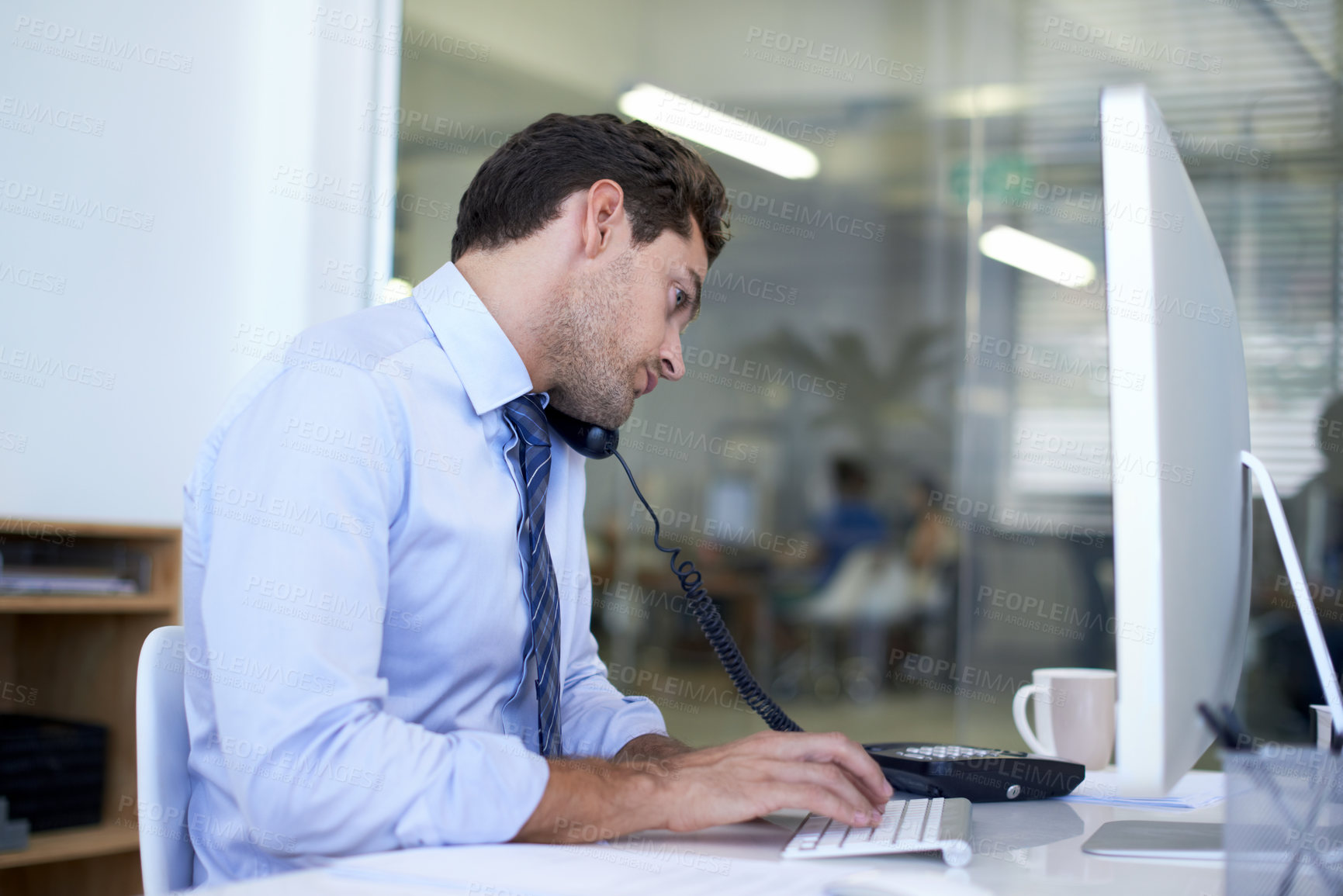 Buy stock photo Businessman, phone call and computer for discussion as financial consultant for client loan, investment or accounting. Male person, telephone and typing in New York office, planning or networking