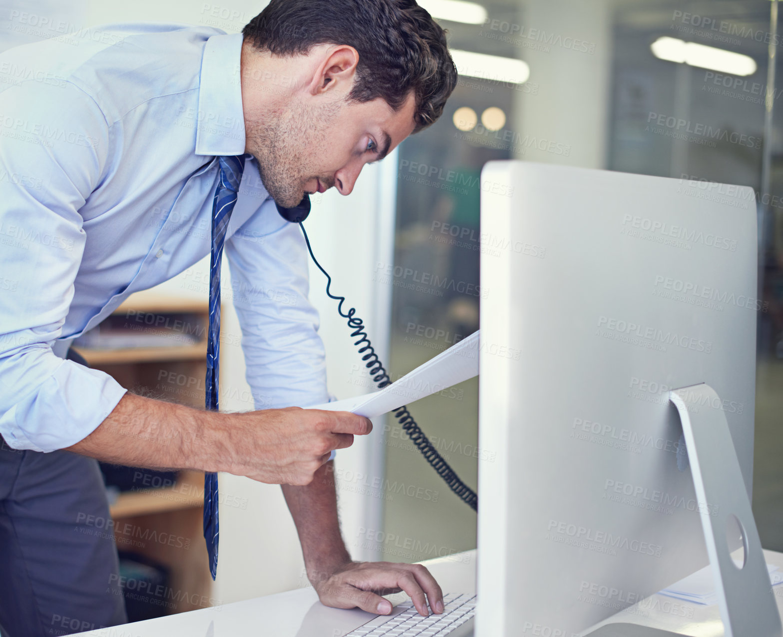 Buy stock photo Businessman, phone call and computer for discussion as with paperwork for client loan, investment or accounting. Male person, telephone and financial consultant in New York, planning or networking