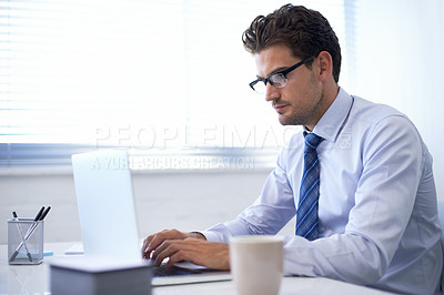 Buy stock photo Businessman, laptop and typing in office or communication as financial consultant, email or internet. Male person, glasses and corporate company in New York or accounting research, loan or investment