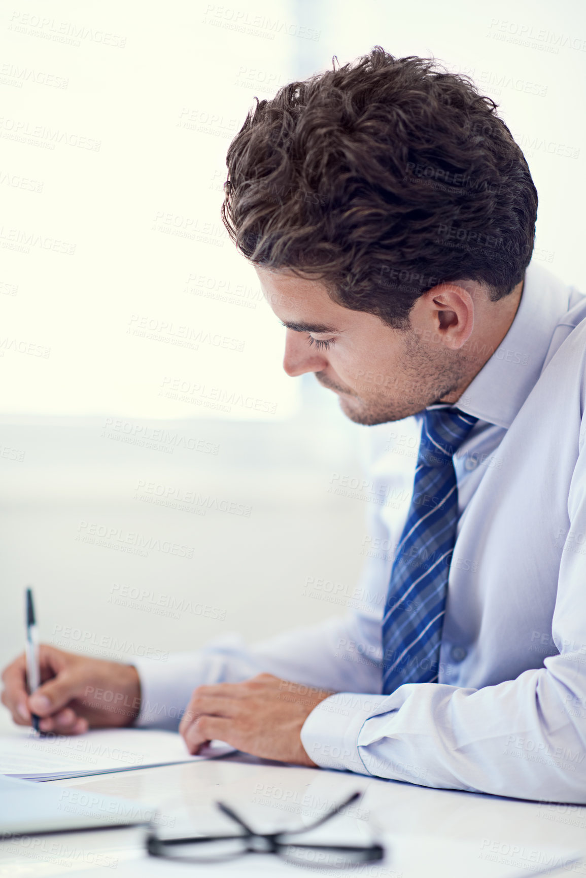 Buy stock photo Businessman, writing notes and document for planning, office and professional workspace. Male person, company and brainstorming for client, startup and entrepreneur for career and corporate 