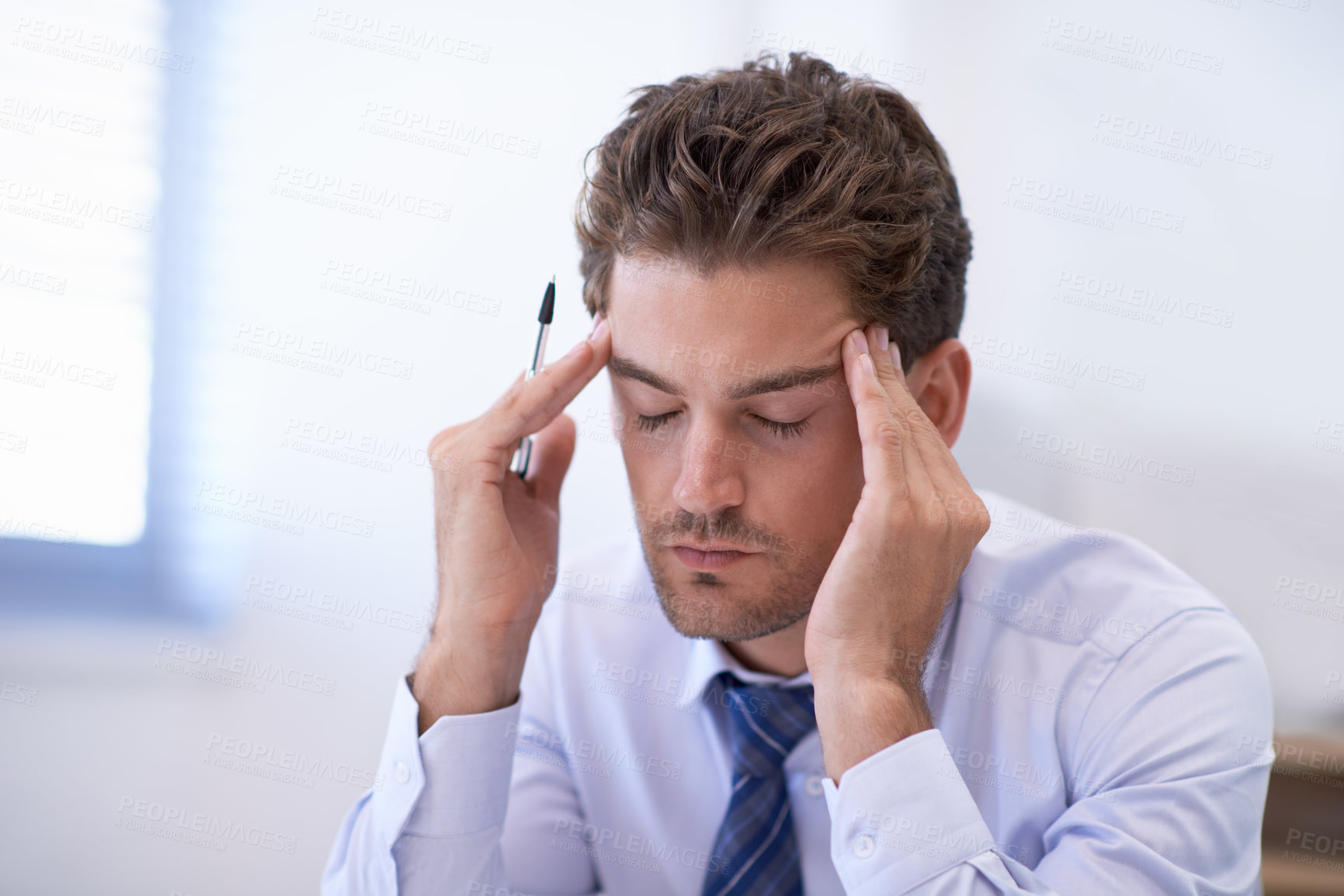 Buy stock photo Headache, stress and business man with fatigue, pain and anxiety for overwork in office. Migraine, depression and professional massage temples for burnout, sick and tired agent frustrated in company