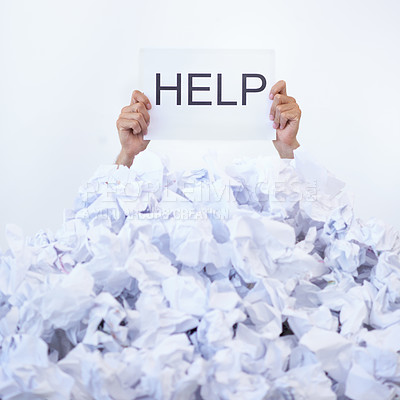 Buy stock photo Person, office and hands with pile of documents, sign and help with burnout, stress and administration. Debt, bills and worker lost in paperwork, overworked and overwhelmed with pressure in crisis.