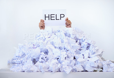 Buy stock photo Person, office and hands with pile of paperwork, sign and help with burnout, stress and administration. Debt, bills and worker lost in documents, overworked and overwhelmed with pressure at desk.
