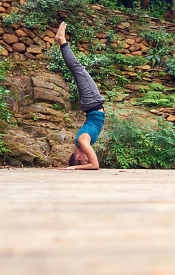 Buy stock photo Woman, yoga and patio with headstand, outdoor and balance on garden deck at home. Zen, heath and wellness with holistic practice, posture and wood floor with body health, plants and flexibility