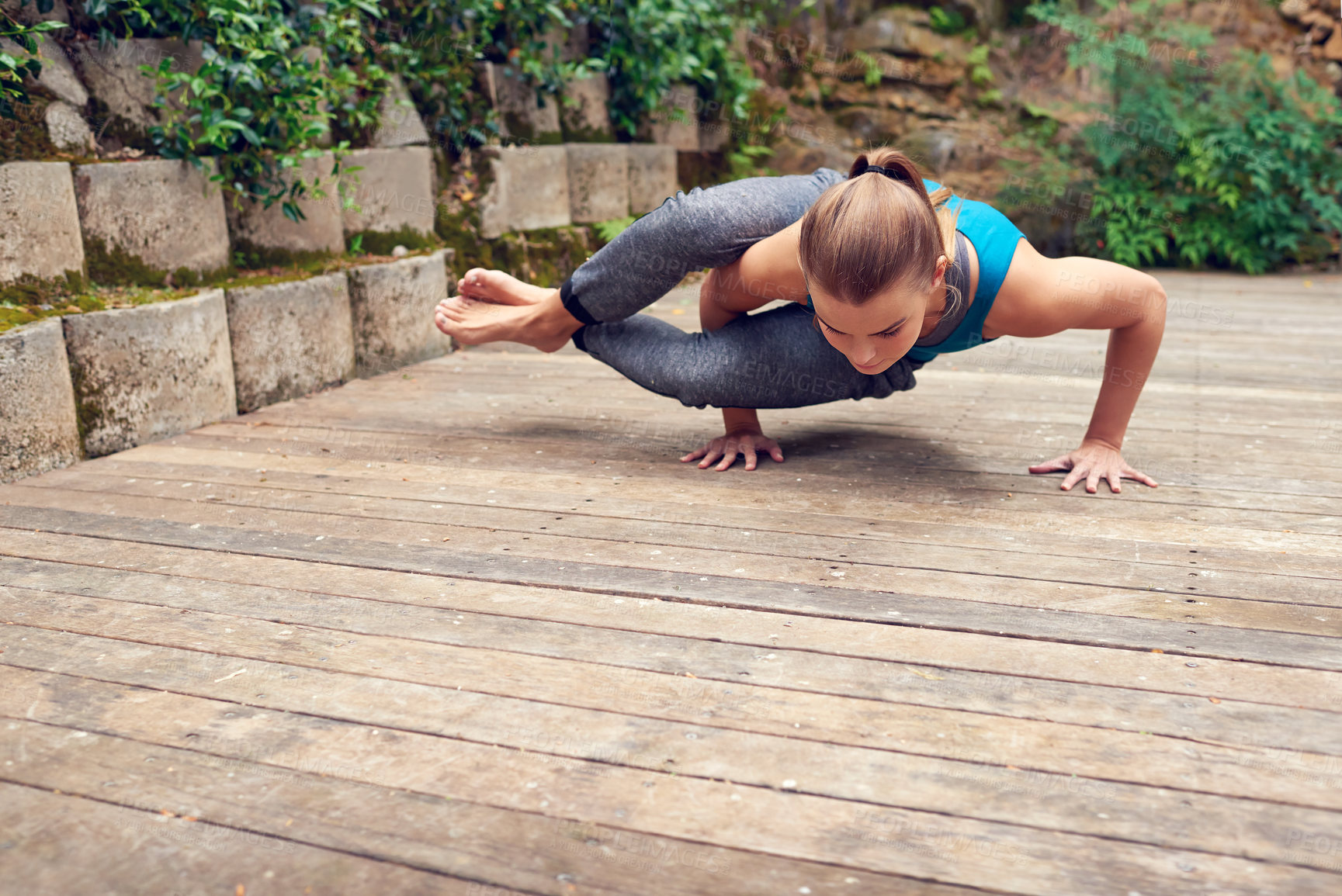 Buy stock photo Pilates, fitness and handstand with woman, balance and outdoor on home patio. Exercise, zen and chakra with girl, garden deck and health workout for holistic summer wellness and yoga meditation