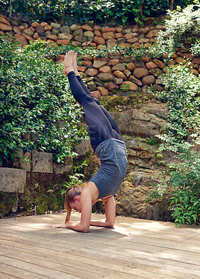 Buy stock photo Yoga, fitness and handstand with girl, balance and outdoor on home patio by pool. Exercise, zen and chakra with woman, garden deck and health workout for holistic summer wellness and meditation