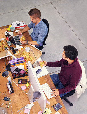 Buy stock photo Business people, men and working while eating with top view for deadline, pizza and coworking company. Programmer, teamwork and technology on lunch with fast food, coding and software development 