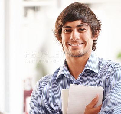 Buy stock photo Businessman, portrait and happy with notebook in office, confident and career pride for startup. Entrepreneur, smile or face of creative writer for job ambition, planning or relax wellness in company