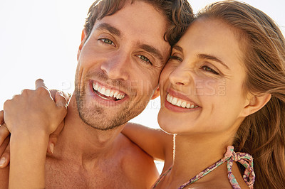 Buy stock photo Couple, happy and holiday portrait with hug, love and care together in sun on vacation outdoor. Relax, smile and date by a beach with summer travel with funny joke and laughing with romance on trip