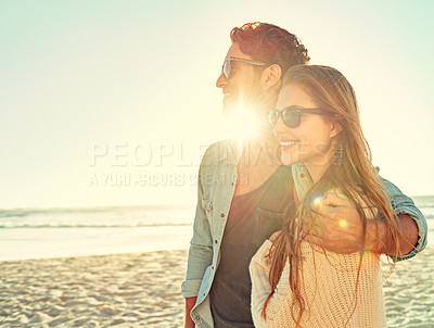 Buy stock photo Sunset, travel and couple hug at a beach with love, adventure and bonding in nature together. Sunrise, lens flare and people embrace at the sea for ocean view, summer and romance on Miami vacation