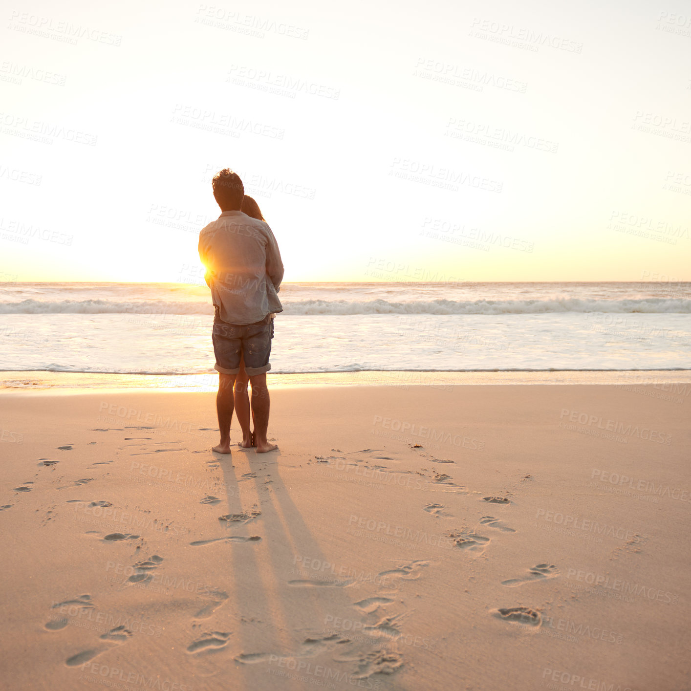 Buy stock photo Man, woman and beach embrace at sunset or summer travel or adventure, bonding or marriage. Happy couple, love and sea hug for dating tourism or back view at nature vacation, environment or holiday