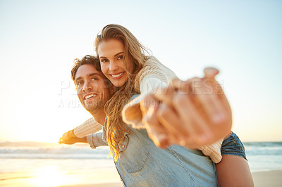 Buy stock photo Man, woman and piggy back at beach sunset or adventure summer for travel, bonding or marriage. Happy couple, embrace and weekend love for dating tourism or nature vacation, environment or holiday