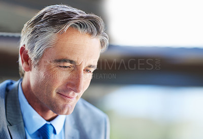 Buy stock photo Shot of a confident-looking mature businessman