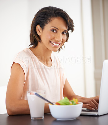Buy stock photo Remote work, laptop and woman eating a salad, healthy food or nutrition in home and office. Happy, portrait and working on lunch break with fruit and vegetables for energy, wellness and diet