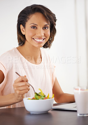 Buy stock photo Eating, salad and woman with laptop, remote work and healthy food for nutrition in home or office. Happy, portrait and working on lunch break with fruit and vegetables for energy or wellness in house